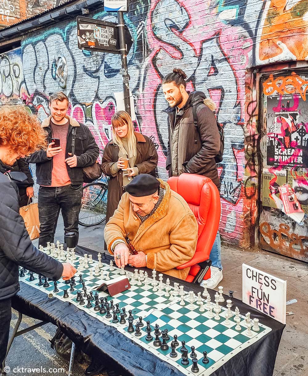 Norman playing fast chess in Brick Lane, Shoreditch east London