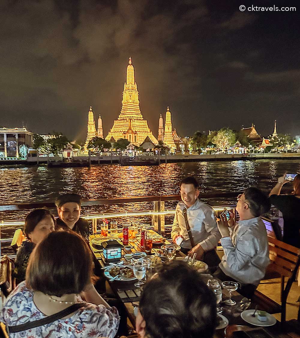 View of Wat Arun temple lit up from a  Bangkok Dinner Cruise