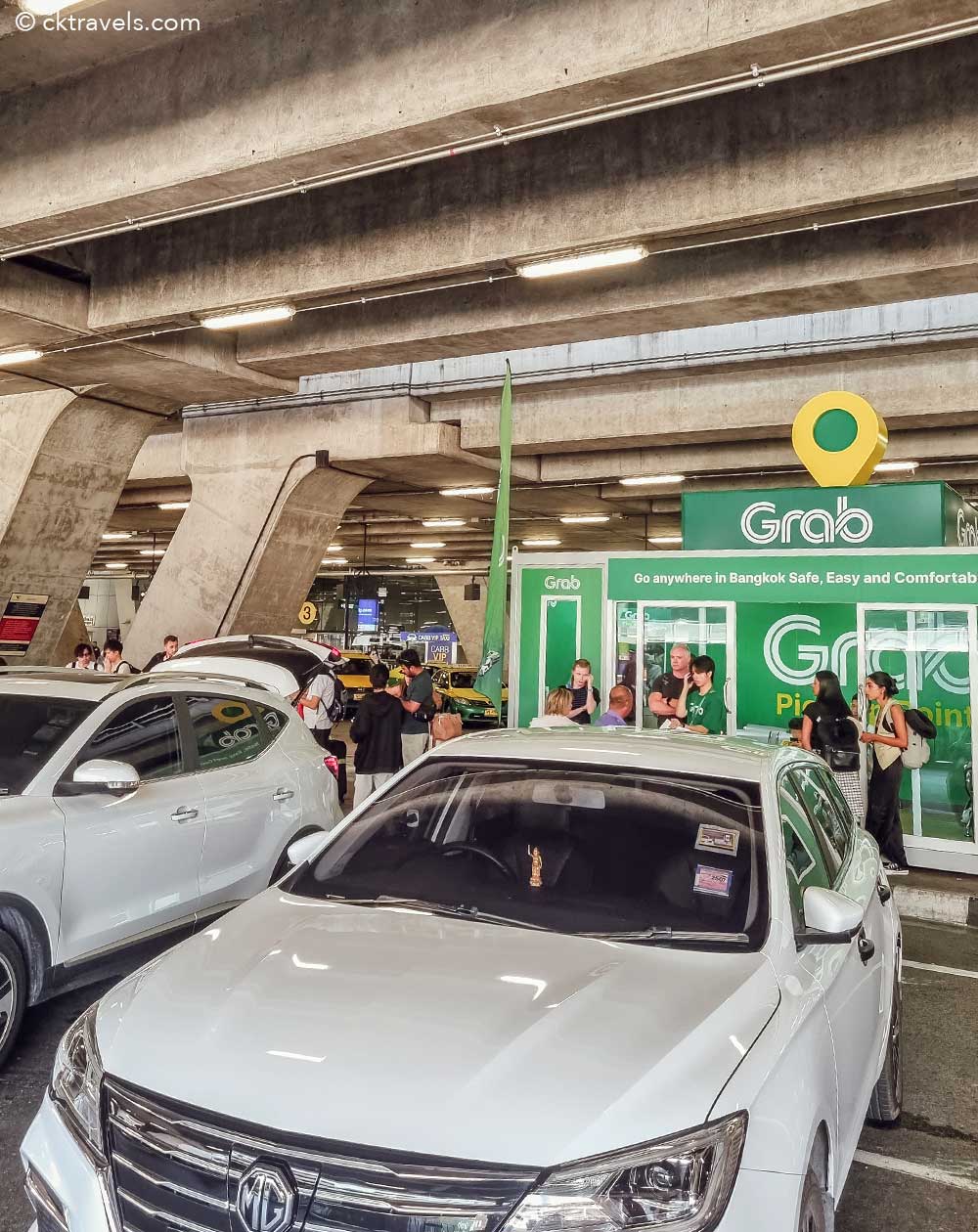 Grab Taxi pick up point gate 4 at Suvarnabhumi Bangkok Airport